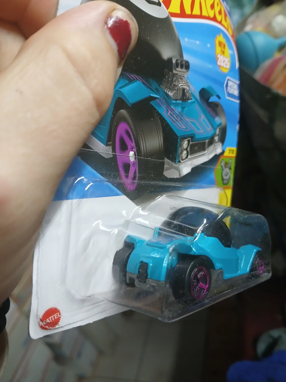 teal Hot Wheels Decidedly Go features a functional Magic 8 Ball design from the